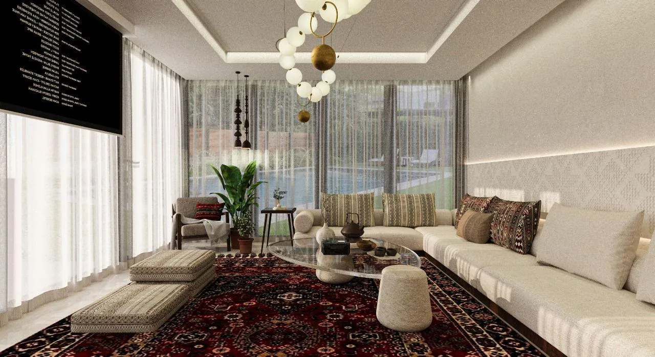A living room with pale seating and a patterned red rug beside glazed walls and curtains