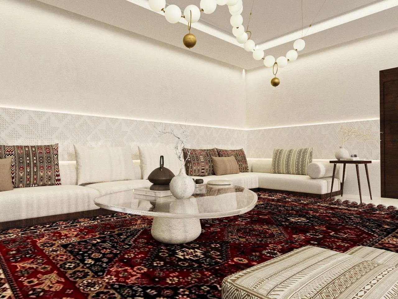 Seating and tables over a red rug against a softly patterned geometric wall